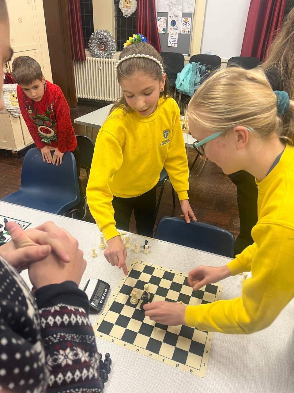 Chess4U students focused on a game at chess club in Glasgow